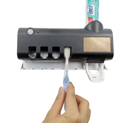 Support UV de brosse à dents de bâti sans fil de mur de stérilisation avec le support de tasse de brosse